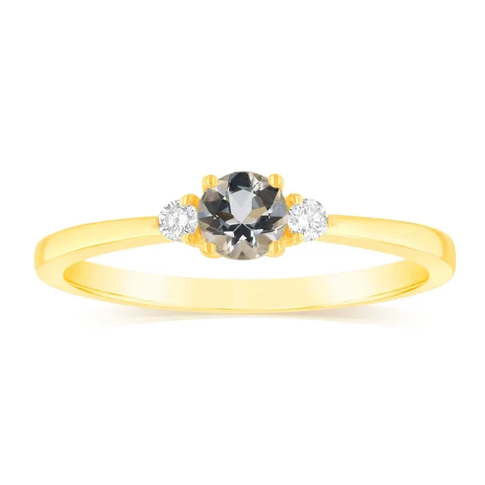 0.24 Carat Aquamarine and Diamond Ring in 9ct Yellow Gold