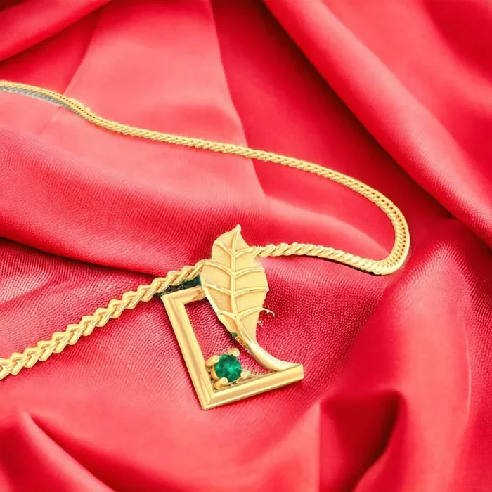 14K Gold Pendant (Without Chain) With Encased Leaf Design And Stone Accent