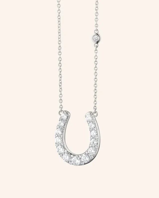 “Luck” Horseshoe Sterling Silver Necklace with White Sapphires