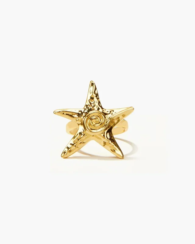 Anillo de estrella de mar dorada