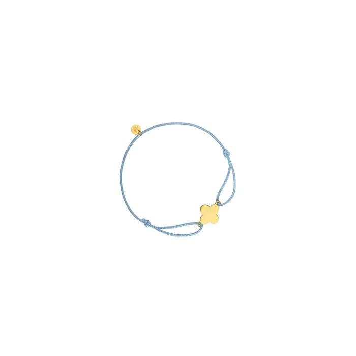 Arthus Bertrand Clover bracelet in yellow gold on blue cord | LEPAGE