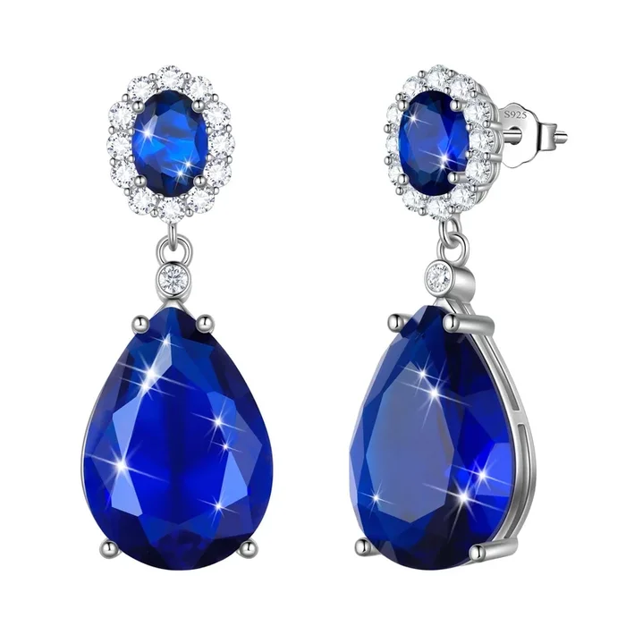 Boucles d’oreilles pendantes en argent sterling 925 serties d’un saphir bleu de 10 carats, pierre de naissance de septembre. Bijou idéal pour un anniversaire ou la fête des mères.