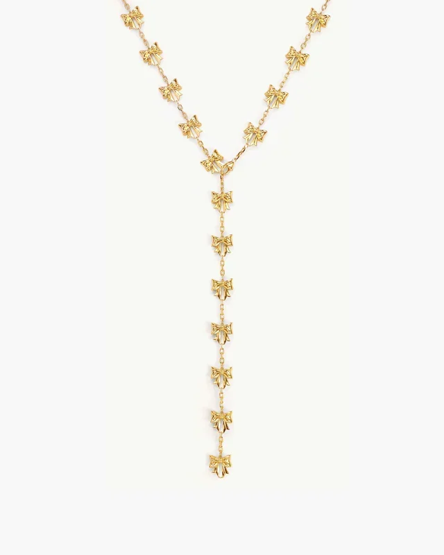 Lange Schleifen-Lariat-Halskette in Gold