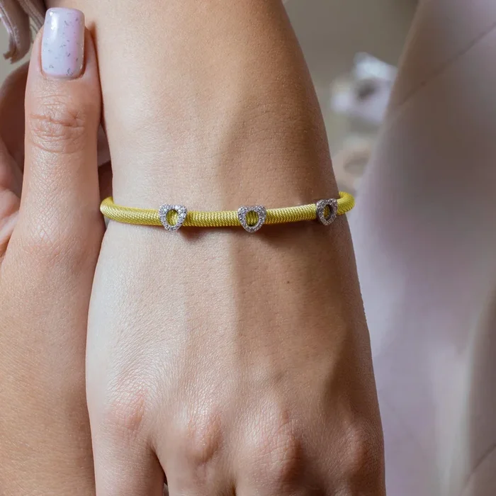 Pulsera de plata 925 chapada en oro y plata con tres corazones abiertos CZ – ECB00019YW