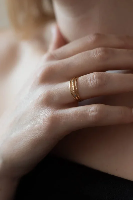 The three-row ring