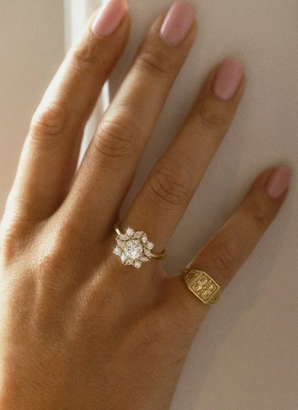 Violet sister diamond entourage ring