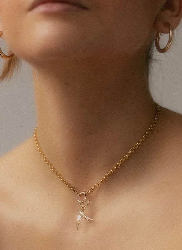 Zwaluw bedel 14k goud